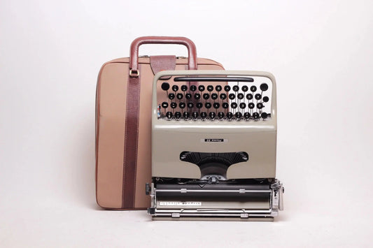 SOLD! Olivetti Pluma 22 Manual Vintage Typewriter, Portable, Serviced - ElGranero Typewriter.Company