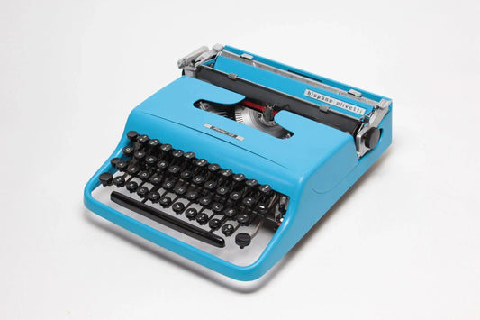 SOLD! Olivetti Pluma 22 Blue, Vintage Manual Typewriter, Refurbished - ElGranero Typewriter.Company