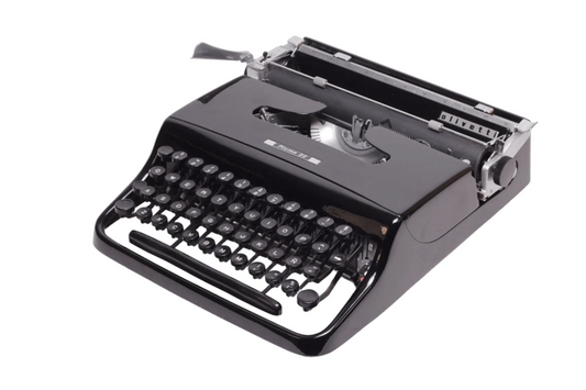 Olivetti Pluma 22 Glossy Black, Vintage Manual Typewriter, Restored - ElGranero Typewriter.Company