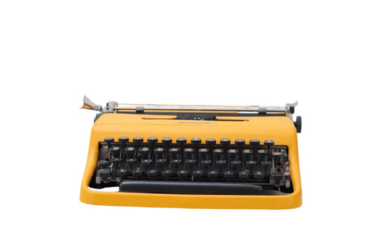 Olivetti Pluma 22 Yellow, Vintage Manual Typewriter, Refurbished - ElGranero Typewriter.Company