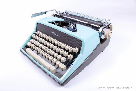 SOLD! Olympia SM7 / Monica Blue, Vintage Manual Typewriter, Restored - ElGranero Typewriter.Company