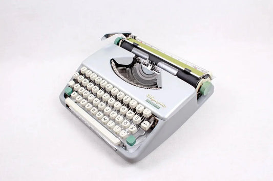 Olympia Splendid 33 Pastel Blue, Vintage Manual Typewriter, Refurbished - ElGranero Typewriter.Company