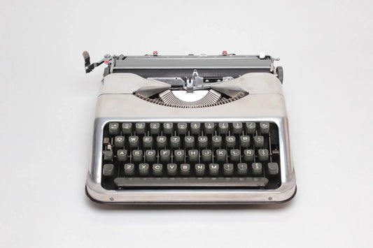 Hermes Baby Polished Silver Portable Vintage Manual Typewriter, Refurbished - ElGranero Typewriter.Company