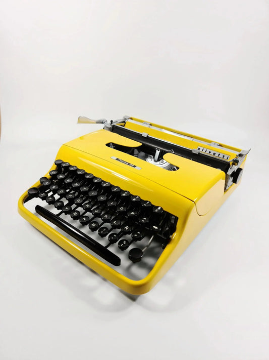 Olivetti Pluma 22, Pro Yellow Manual Vintage Typewriter, Restored - ElGranero Typewriter.Company