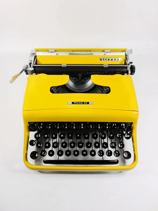 Olivetti Pluma 22, Pro Yellow Manual Vintage Typewriter, Restored - ElGranero Typewriter.Company