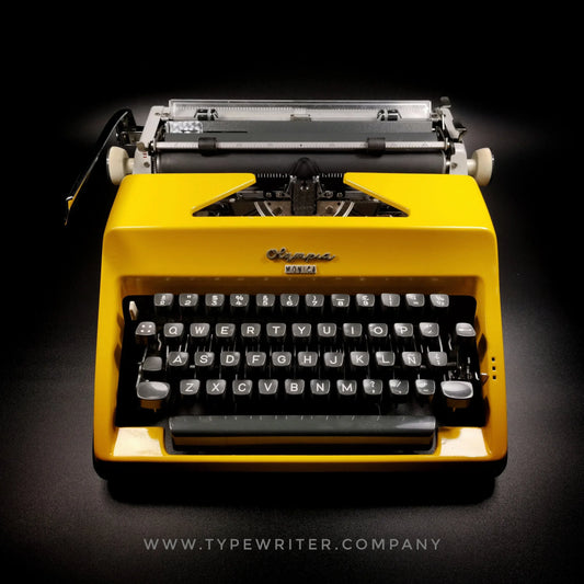 Olympia SM Glossy Yellow Vintage Manual Portable Typewriter, Refurbished - ElGranero Typewriter.Company