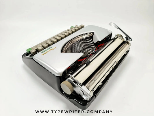SOLD! Olympia Splendid 33 Silver, Vintage Manual Typewriter, Restored - ElGranero Typewriter.Company