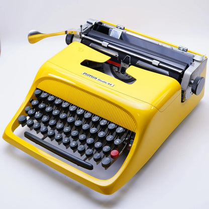 Olivetti Studio 44 Glossy Yellow, Vintage Manual Typewriter, Restored - ElGranero Typewriter.Company