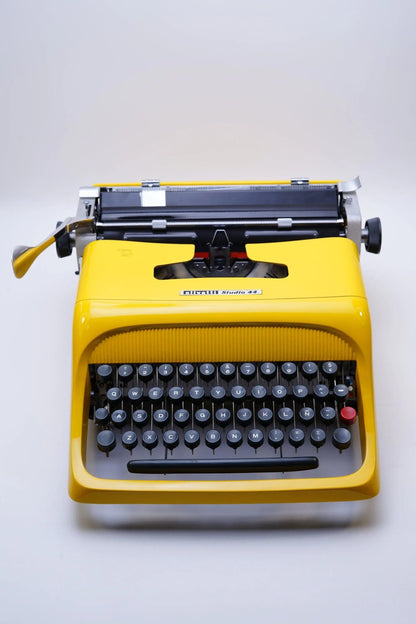 Olivetti Studio 44 Glossy Yellow, Vintage Manual Typewriter, Restored - ElGranero Typewriter.Company