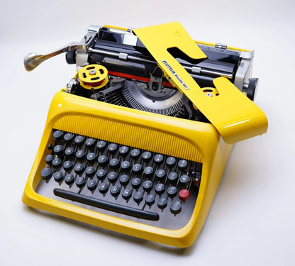 Olivetti Studio 44 Glossy Yellow, Vintage Manual Typewriter, Restored - ElGranero Typewriter.Company