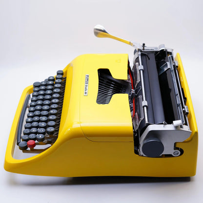 Olivetti Studio 44 Glossy Yellow, Vintage Manual Typewriter, Restored - ElGranero Typewriter.Company