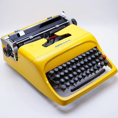 Olivetti Studio 44 Glossy Yellow, Vintage Manual Typewriter, Restored - ElGranero Typewriter.Company