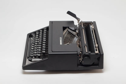 Olivetti Dora, Black Portable Manual Vintage Typewriter, Restored - ElGranero Typewriter.Company