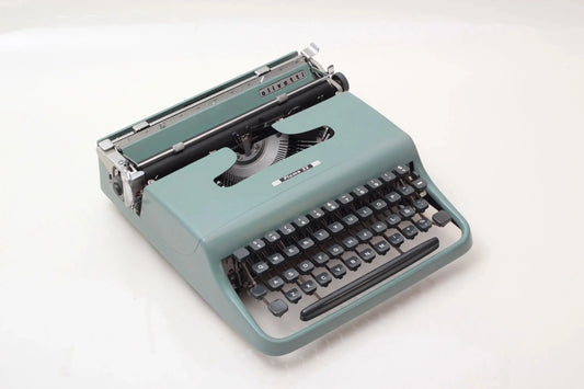 Olivetti Pluma 22 Original Light Teal Typewriter, Vintage, Restored - ElGranero Typewriter.Company