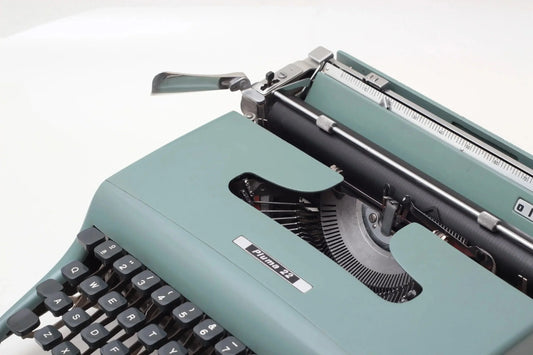 Olivetti Pluma 22 Original Light Teal Typewriter, Vintage, Restored - ElGranero Typewriter.Company