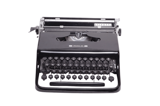 Olivetti Pluma 22 Glossy Black, Vintage Manual Typewriter, Restored - ElGranero Typewriter.Company