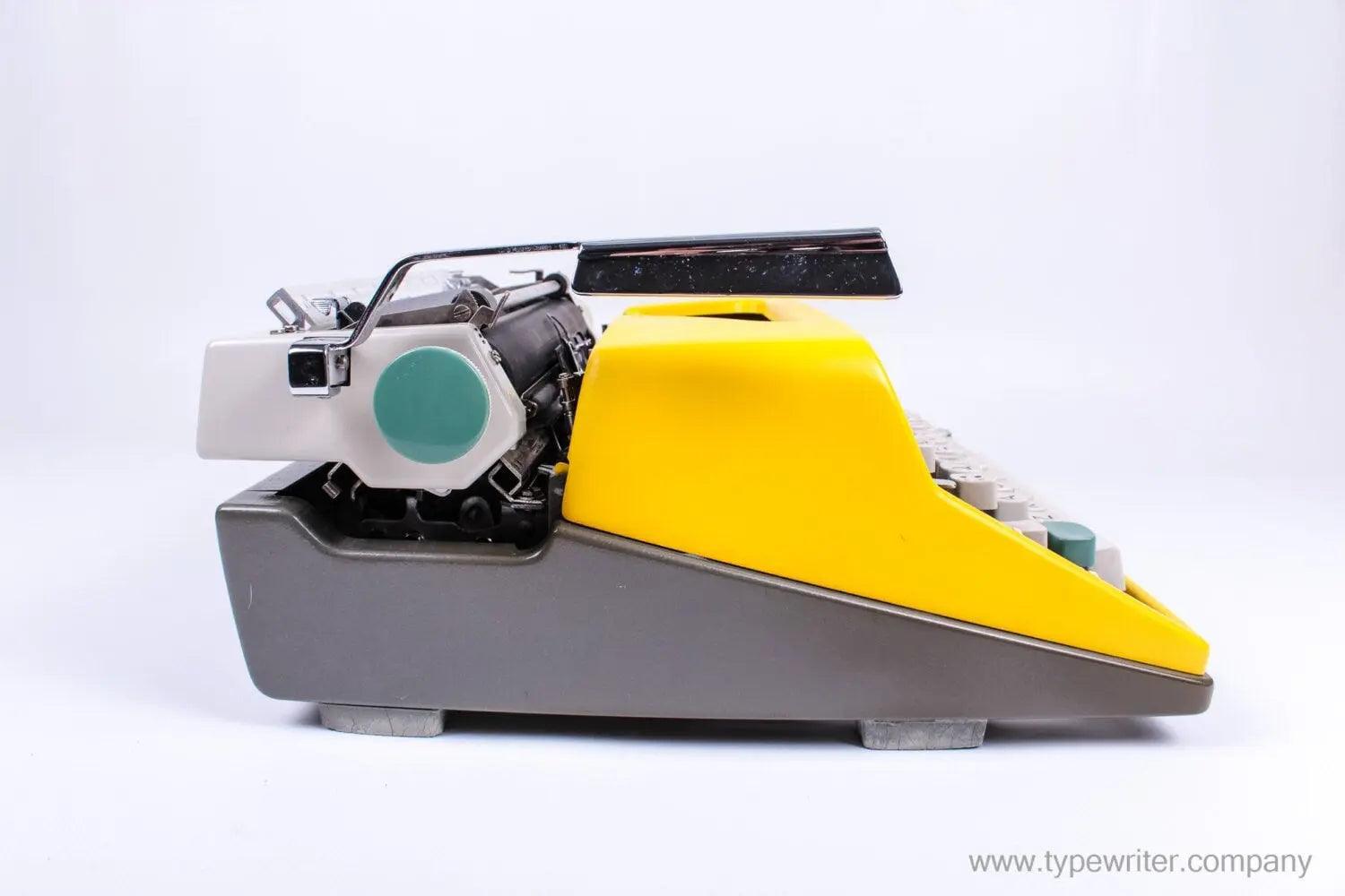 SOLD! Olympia SM 7 / 9 Black & Yellow, Manual Typewriter, Refurbished - ElGranero Typewriter.Company