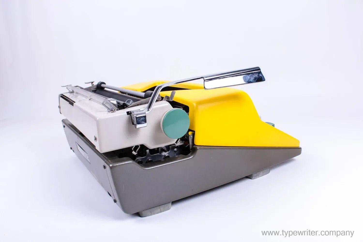 SOLD! Olympia SM 7 / 9 Black & Yellow, Manual Typewriter, Refurbished - ElGranero Typewriter.Company