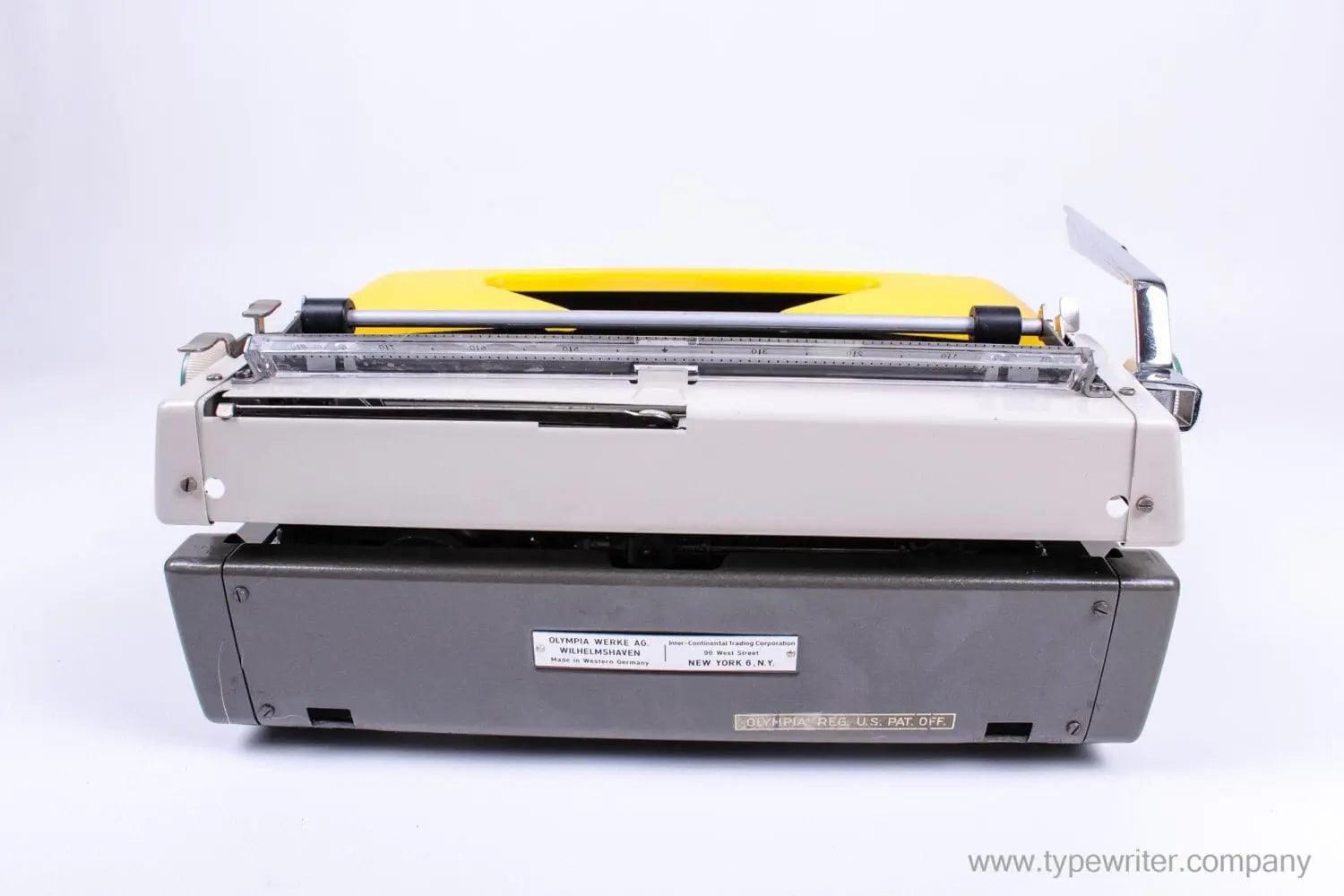SOLD! Olympia SM 7 / 9 Black & Yellow, Manual Typewriter, Refurbished - ElGranero Typewriter.Company