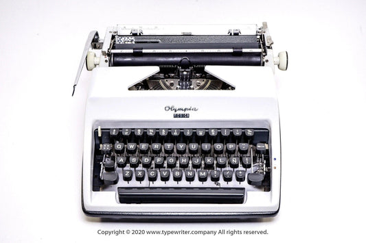 SOLD! Olympia SM White, Vintage Manual Typewriter, Restored - ElGranero Typewriter.Company