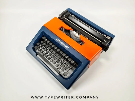 SOLD! Olivetti Lettera 25 Navy Blue / Orange, Vintage Manual Typewriter, Restored - ElGranero Typewriter.Company