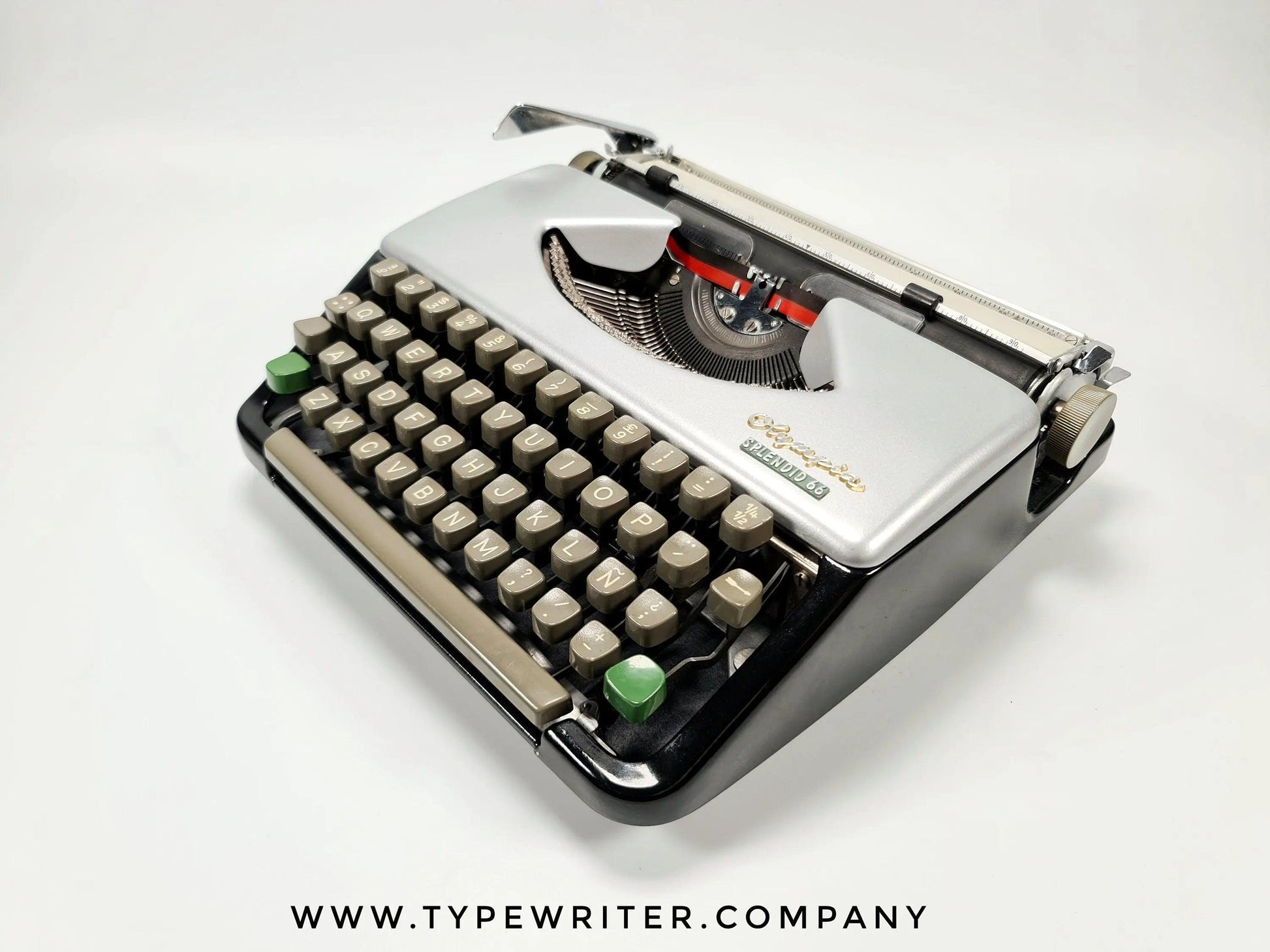 SOLD! Olympia Splendid 33 Silver, Vintage Manual Typewriter, Restored - ElGranero Typewriter.Company