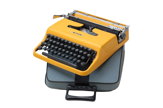 Olivetti Pluma 22 Yellow Vintage, Manual Typewriter, Serviced